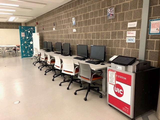 view of desktop computers and printing station available in the Math section of the MSLC