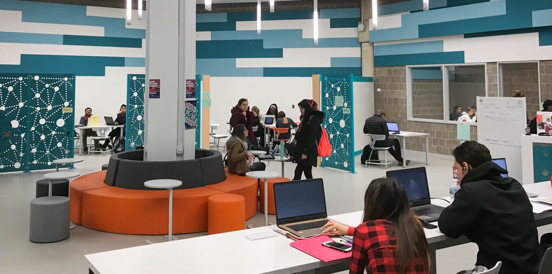 view of center of MSLC with students studying in various sections